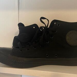 Men's Converse Chuck Taylor All Star high tops.